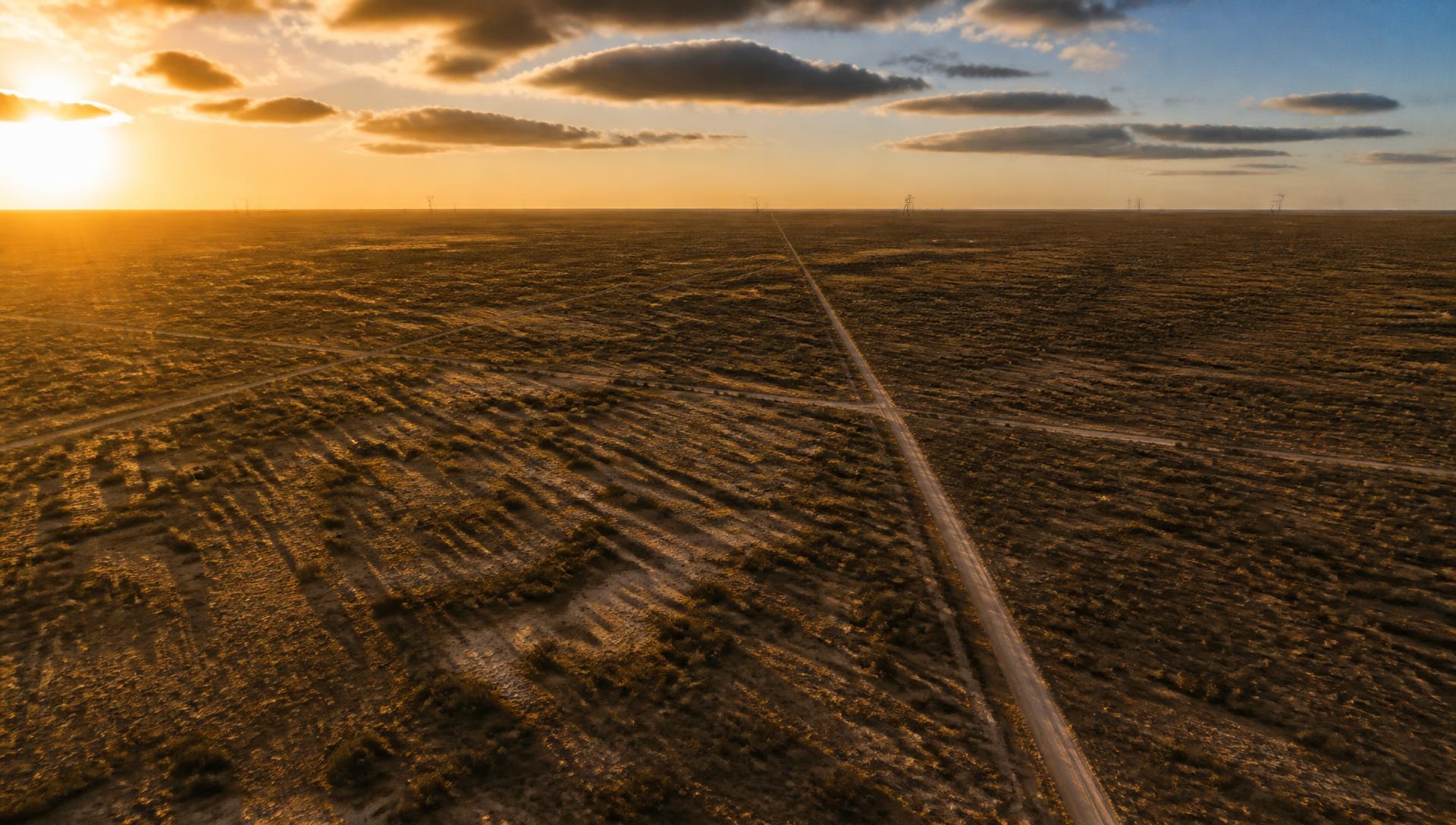 Aerial view of open West Texas land at golden hour